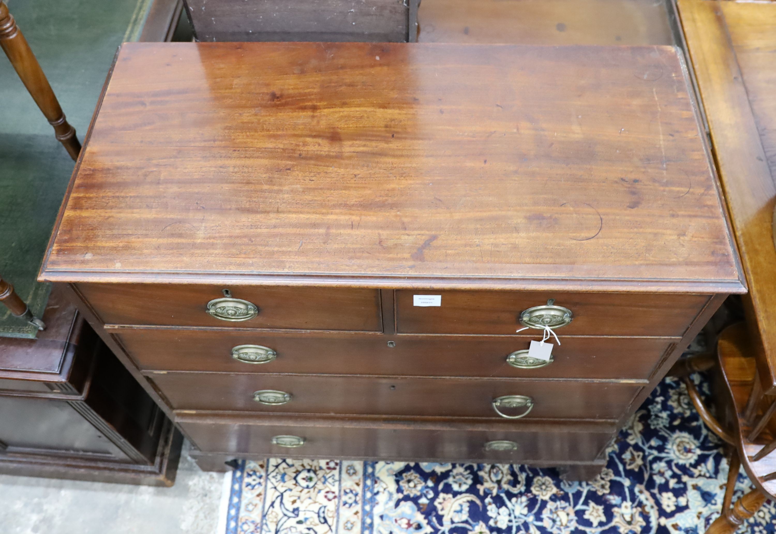 A George III mahogany straight front chest, fitted three long drawers and two short drawers, width 102cm, depth 49cm, height 102cm